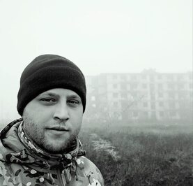 Николай